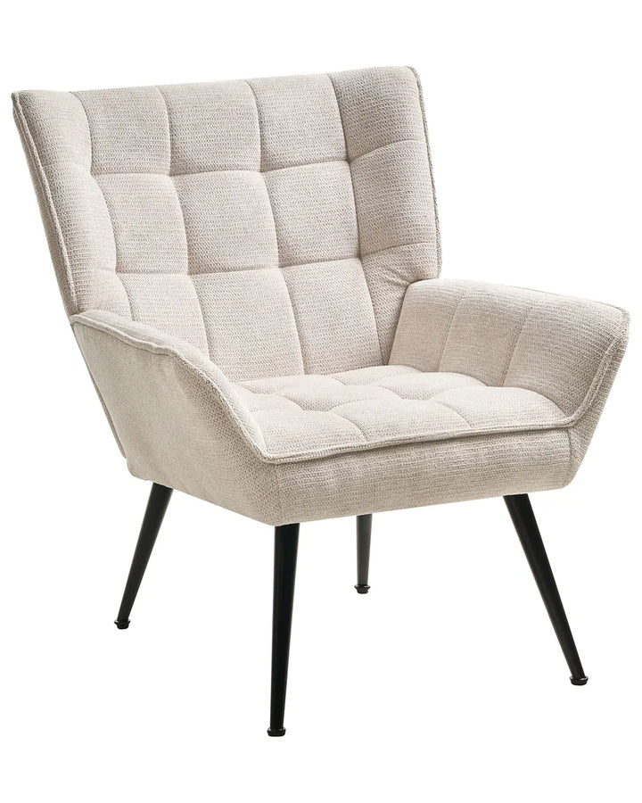 Beige armchair with quilted design on a white background
