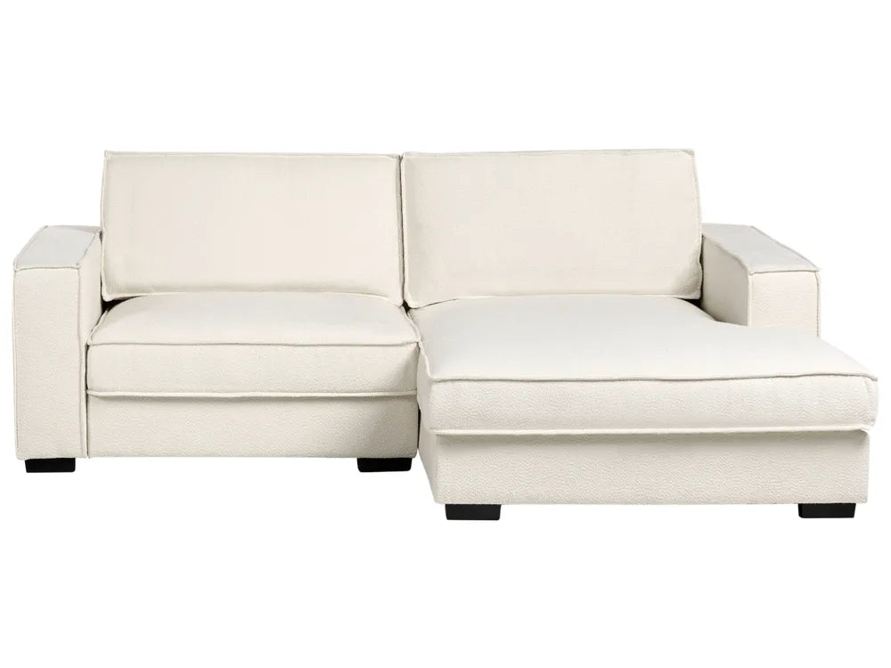 White sectional sofa on a white background