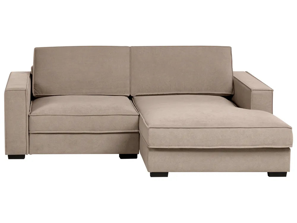 Beige sectional sofa on a white background