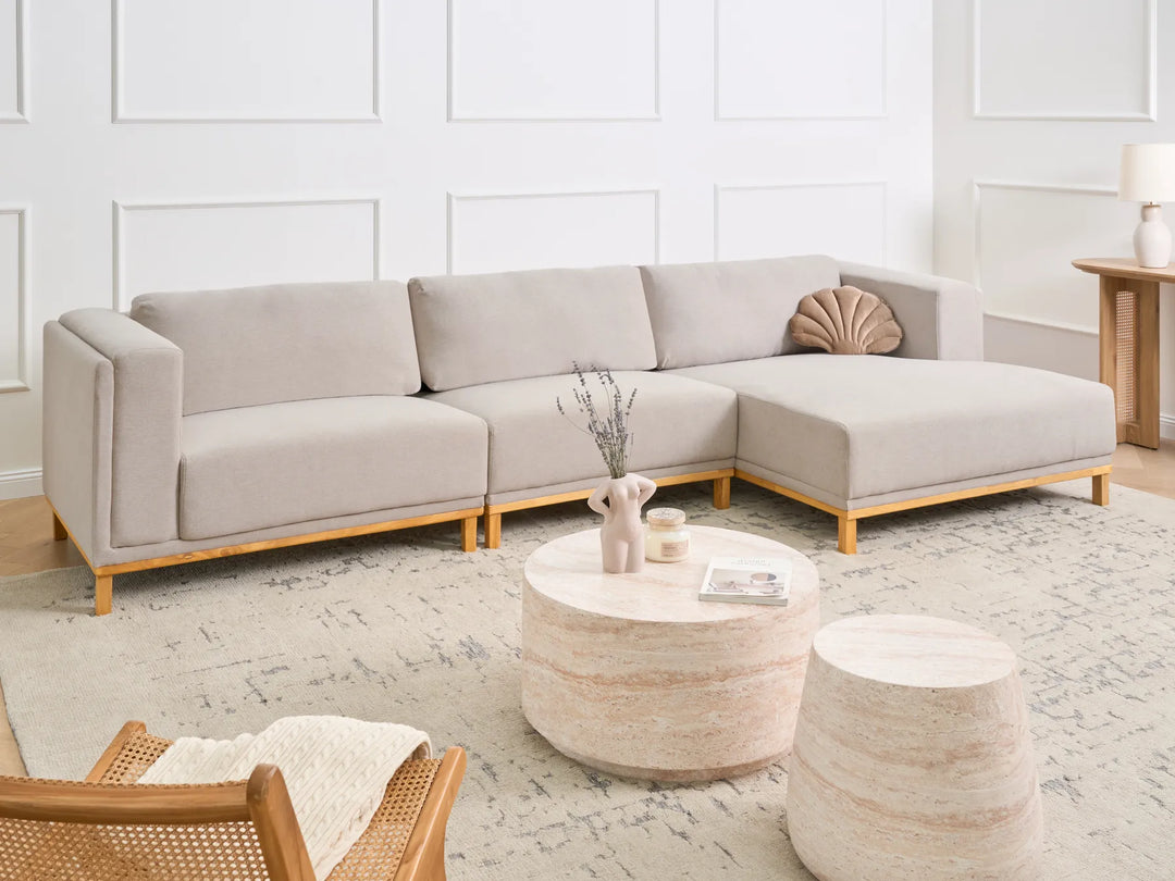 Left hand light beige corner sofa with wooden legs