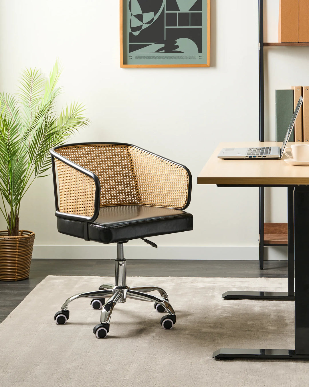 Black office chair with woven backrest in a modern office setting