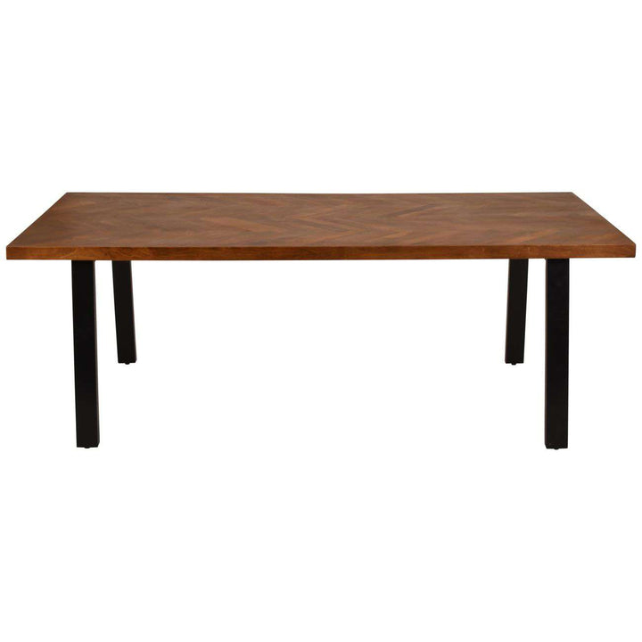 Wooden table with black legs on a white background