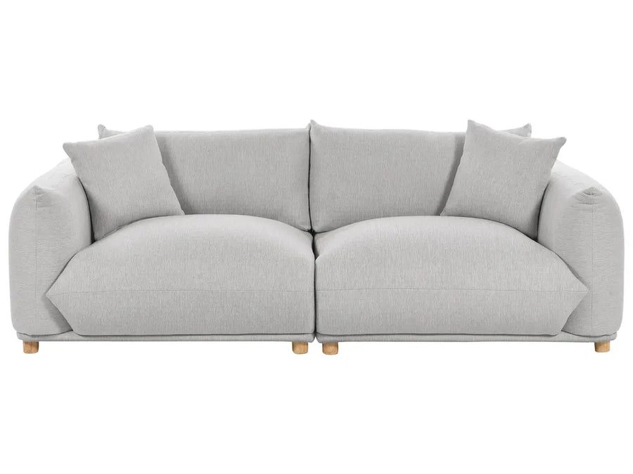 Gray sofa with four cushions on a white background