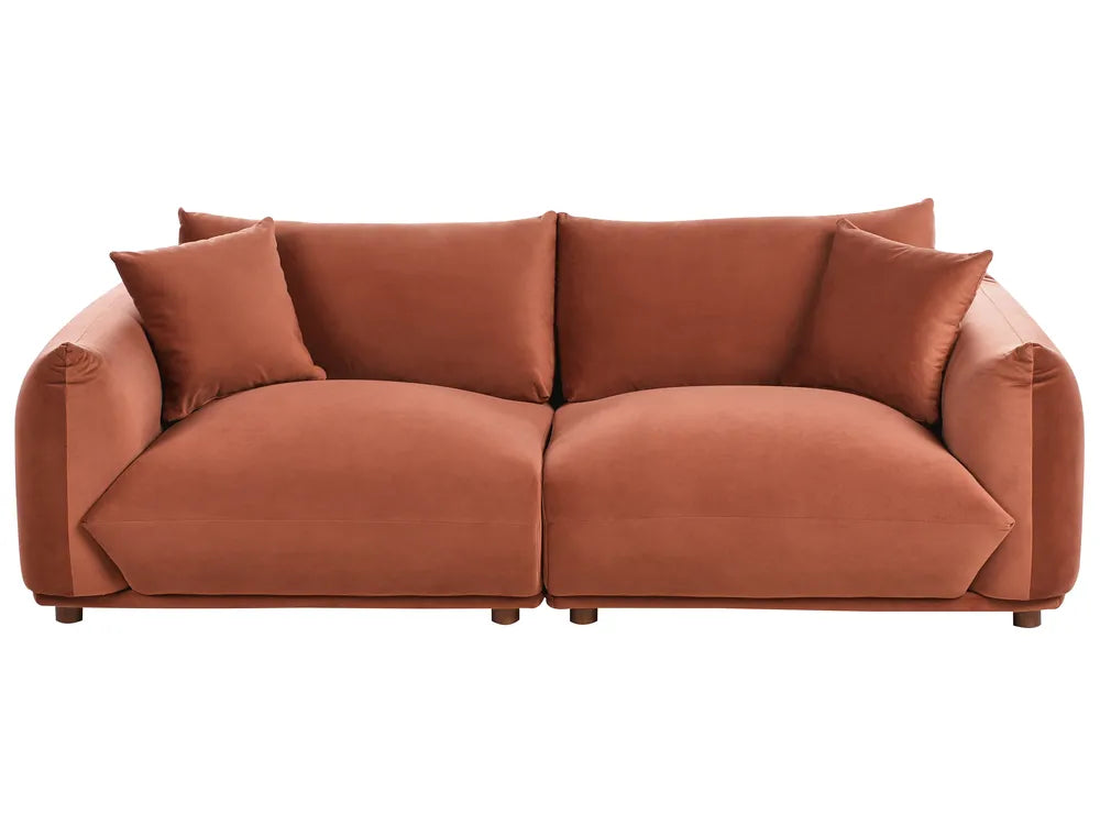 Brown sofa with cushions on a white background