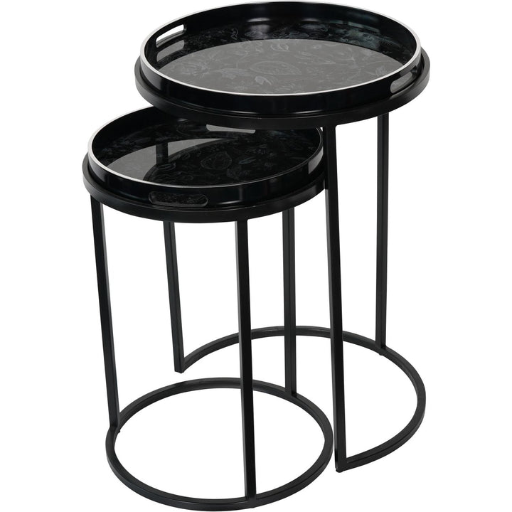 Set of two black nesting tables with decorative tops on a white background
