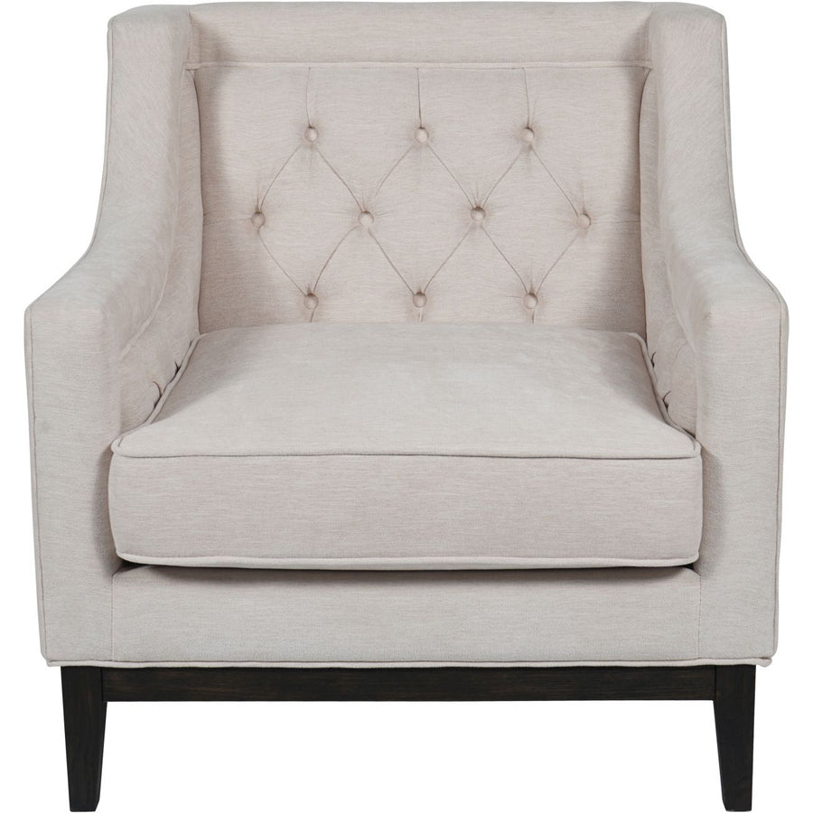 Beige armchair with tufted backrest on a white background