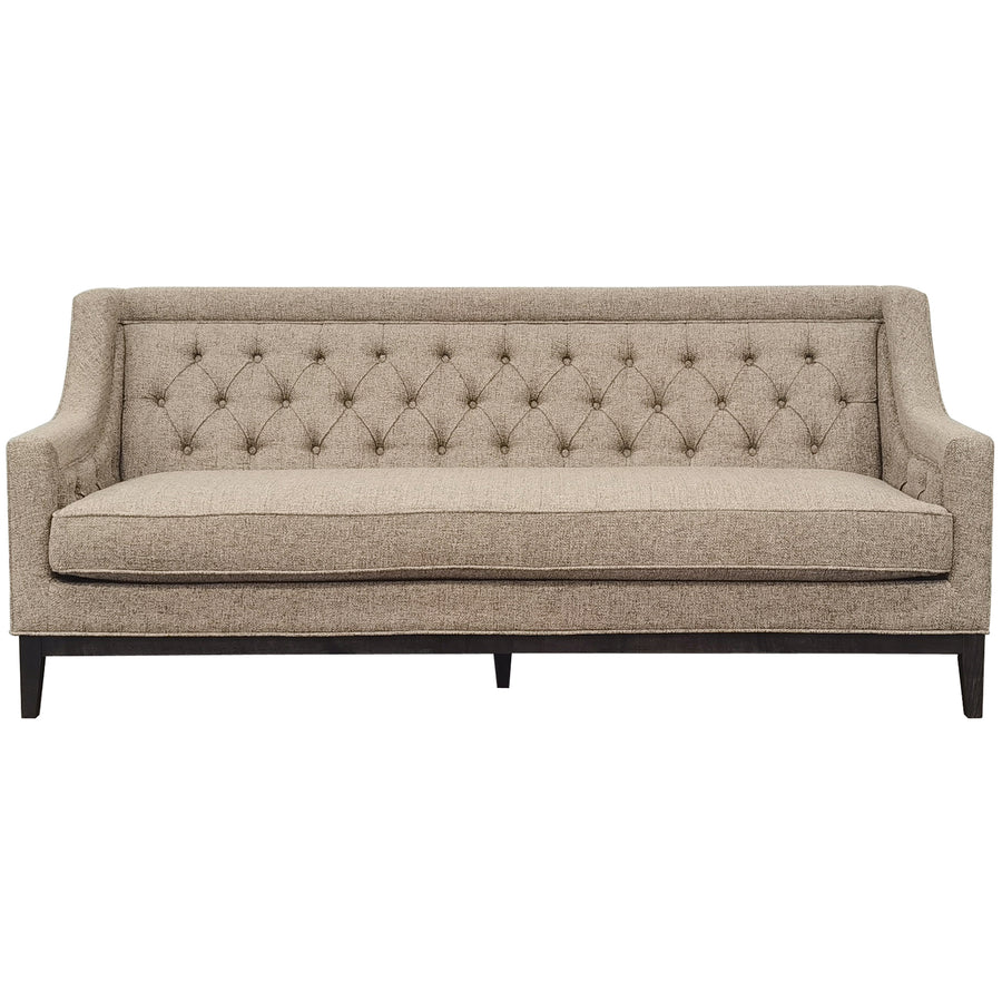 Beige tufted sofa on a white background