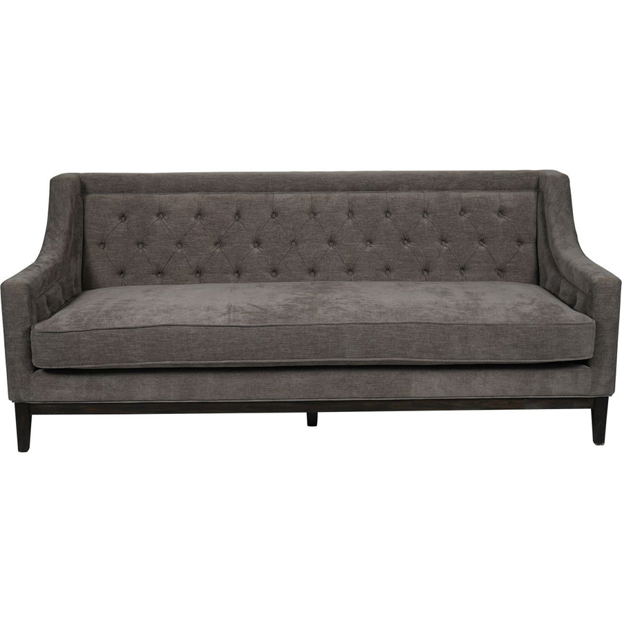 Gray tufted sofa on a white background