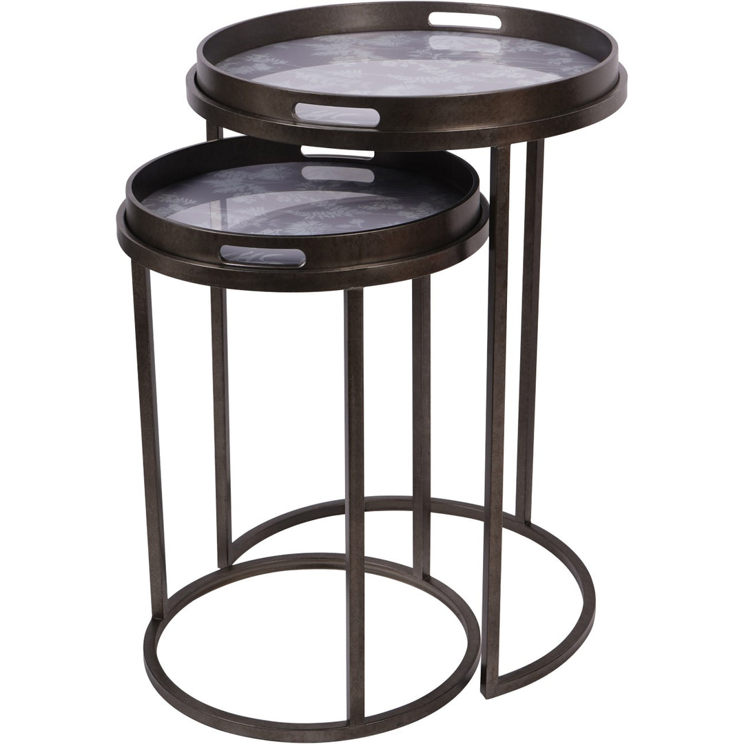 Set of two round nesting tables with marble-like tops on a white background