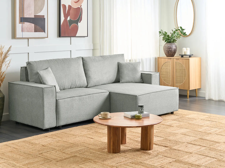 3-seater grey corner sofa bed with hidden storage and soft upholstery, contemporary design