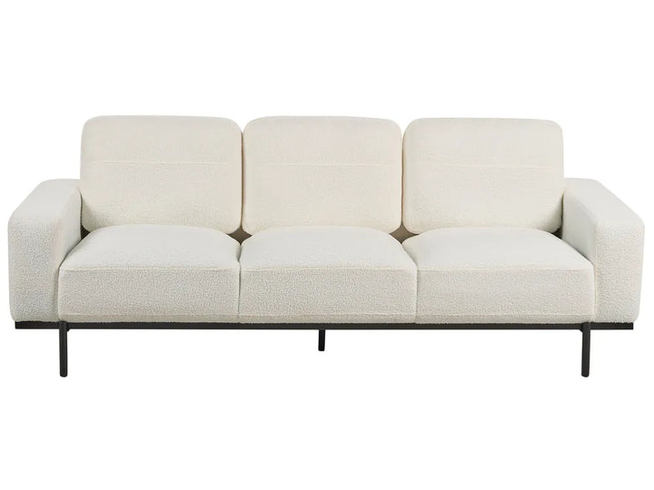 Beige sofa with black metal frame on a white background