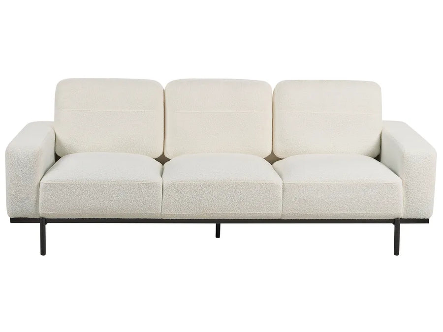 Beige sofa with black metal frame on a white background