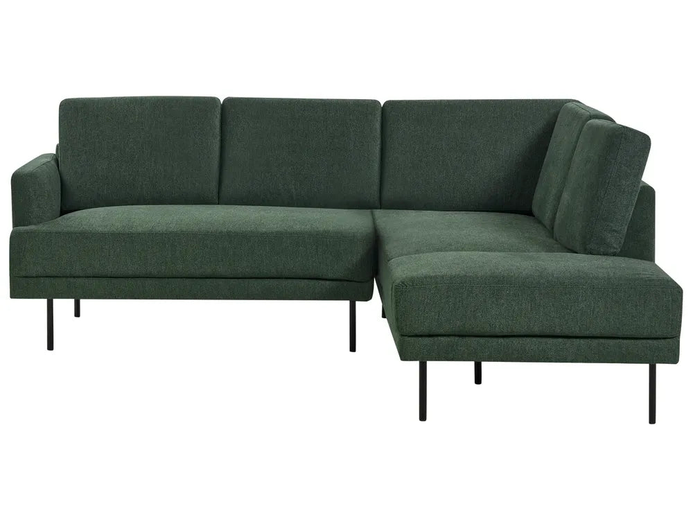 Green sectional sofa on a white background