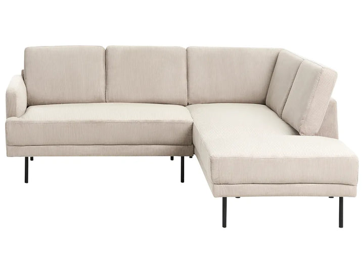 Beige sectional sofa on a white background