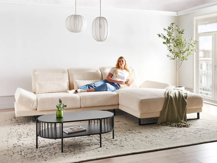 4‑seater beige corduroy L‑shaped corner sofa with plush cushioning and adjustable armrests