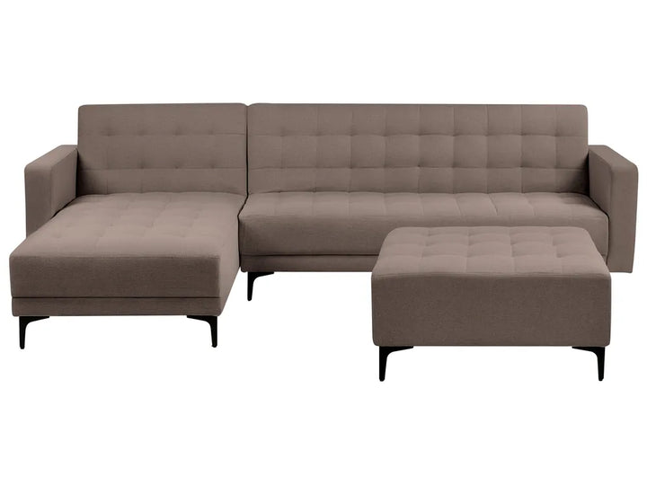 Brown sectional sofa with ottoman on a white background