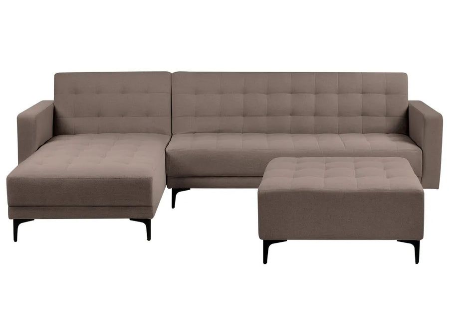 Brown sectional sofa with ottoman on a white background