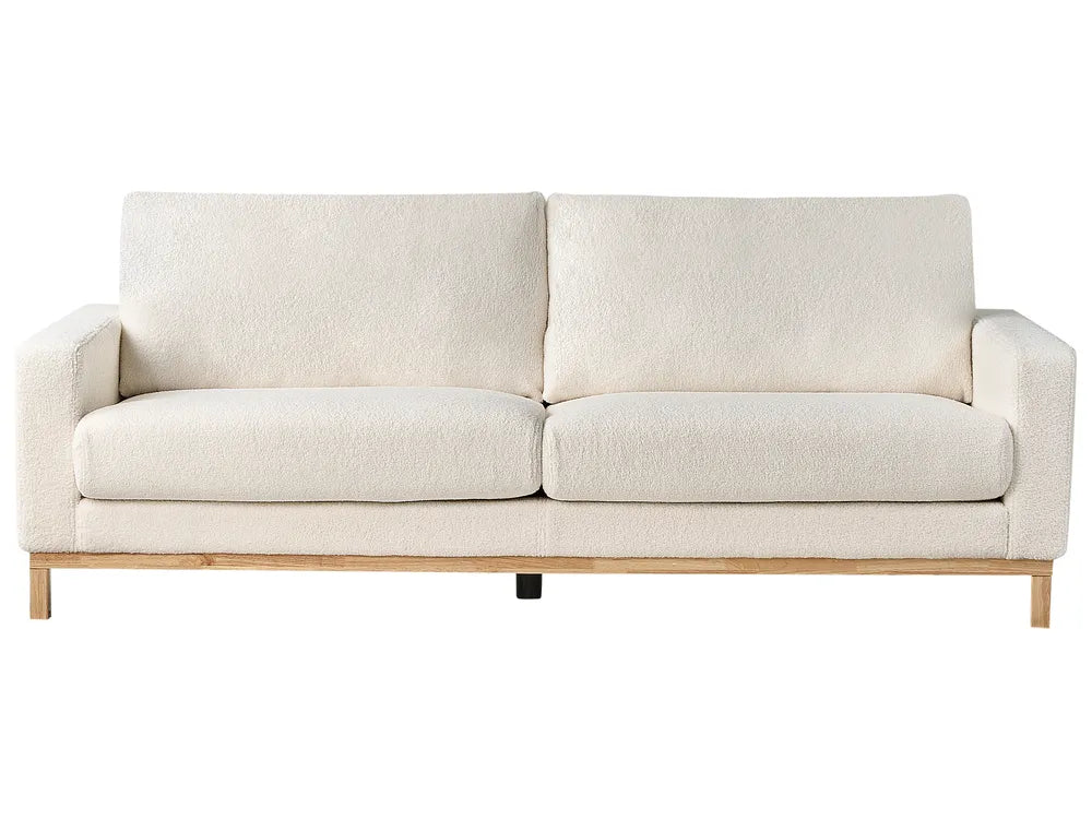Beige sofa on a white background