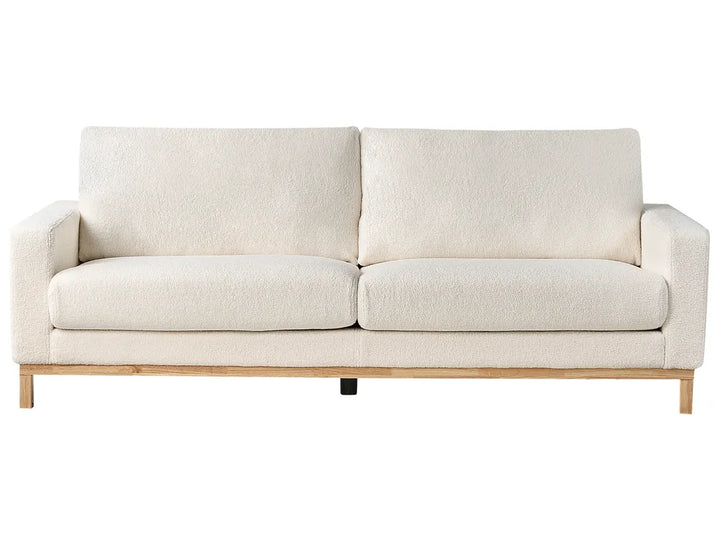 Beige sofa on a white background