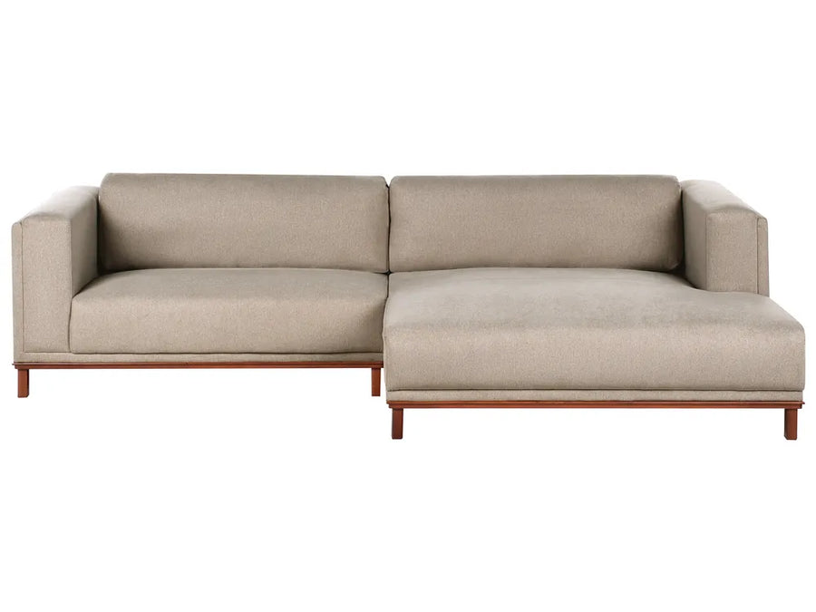 Taupe fabric left‑hand corner sofa with water‑repellent upholstery and wooden legs in a modern living room
