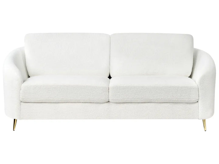 White bouclé 3 seater sofa with curved shape and padded cushions