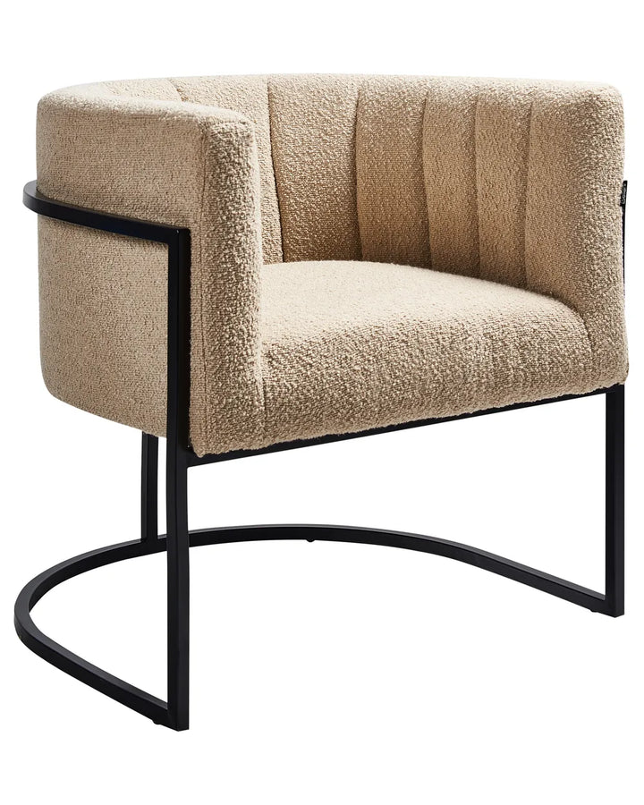 Beige armchair with black metal frame on a white background