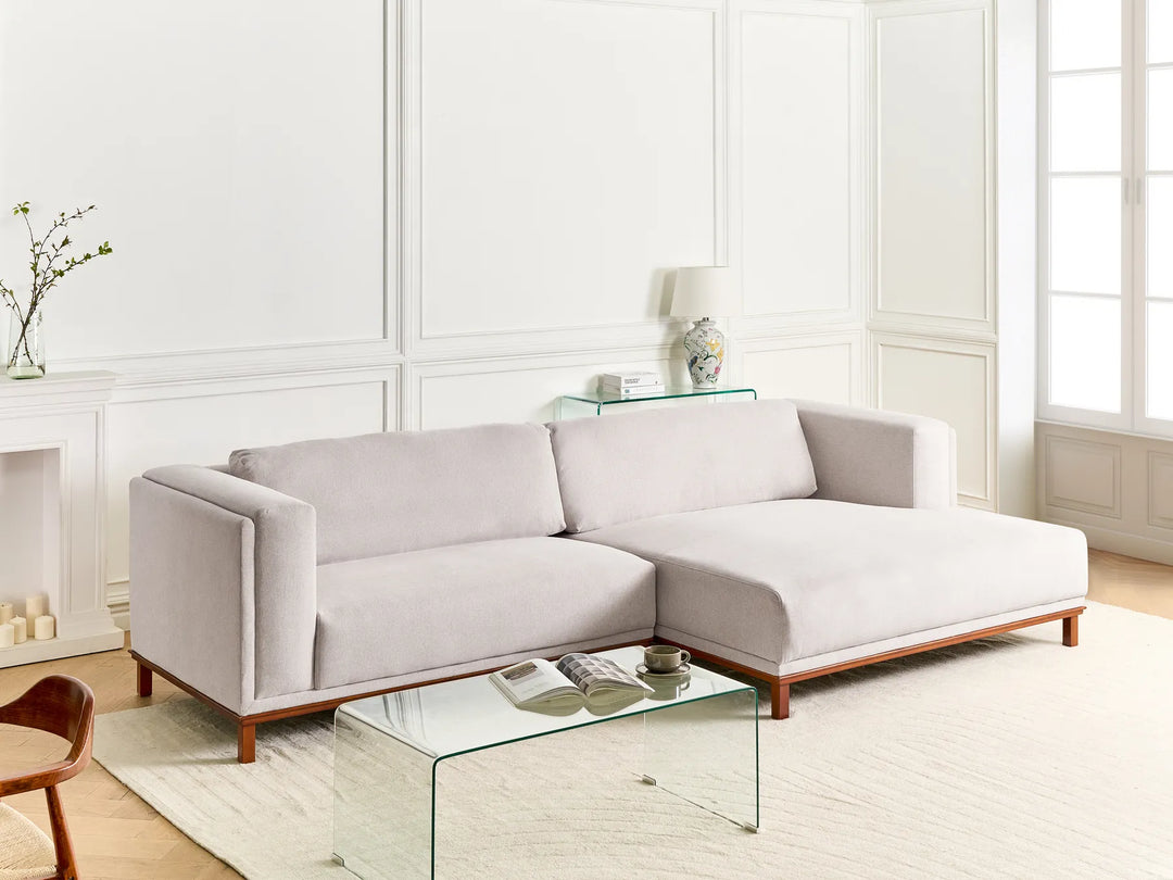 4‑seater light beige fabric corner sofa left orientation with plush cushions and sturdy eucalyptus wood legs