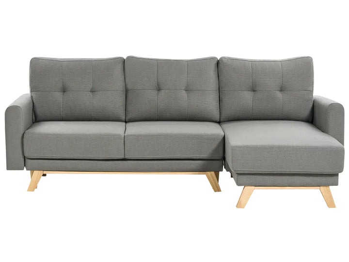 Modern grey corner sofa with fold-out bed and storage