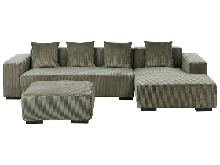 Gray sectional sofa with matching ottoman on a white background