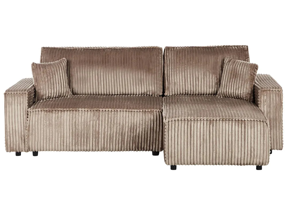 Brown ribbed sofa with matching ottoman on a white background