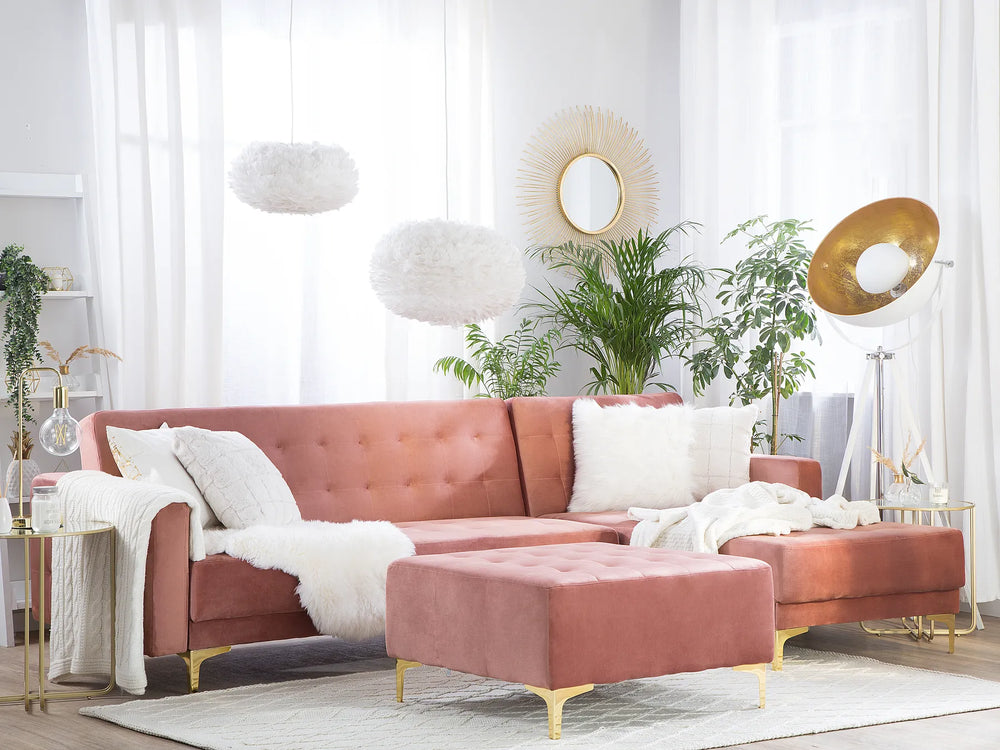 Pink velvet corner sofa with ottoman, left-hand layout