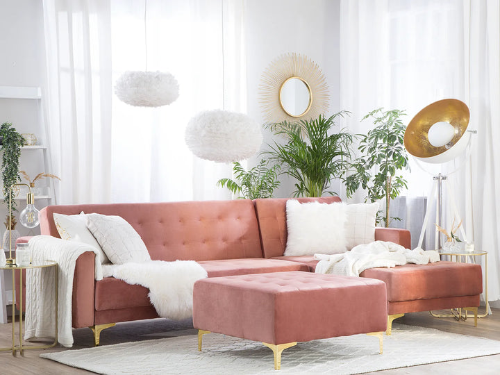 Pink velvet corner sofa with ottoman, left-hand layout