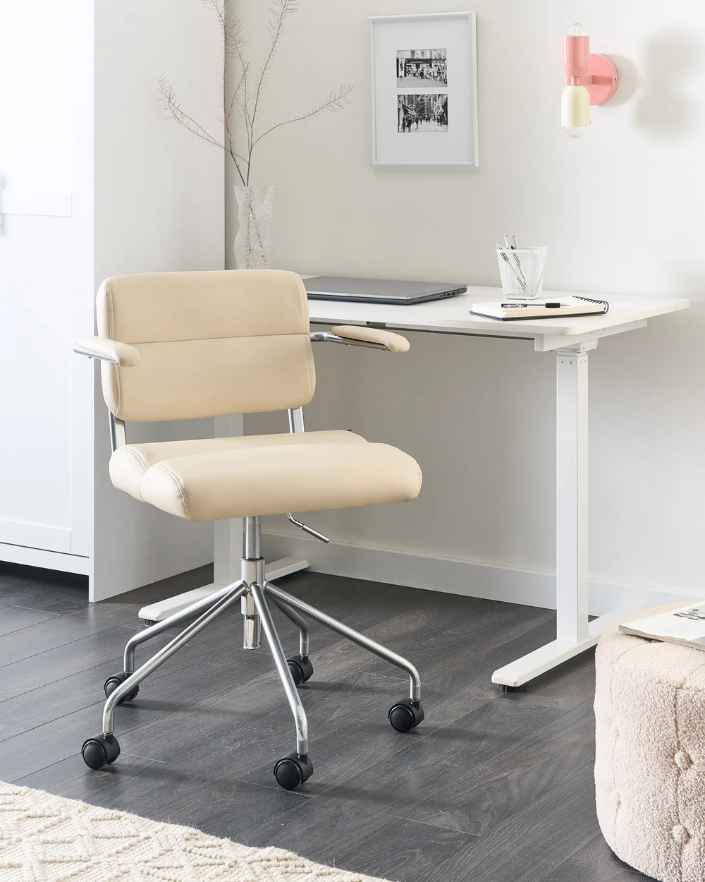 Featuring a sleek off-white faux leather upholstery that's effortless to clean and maintain. 