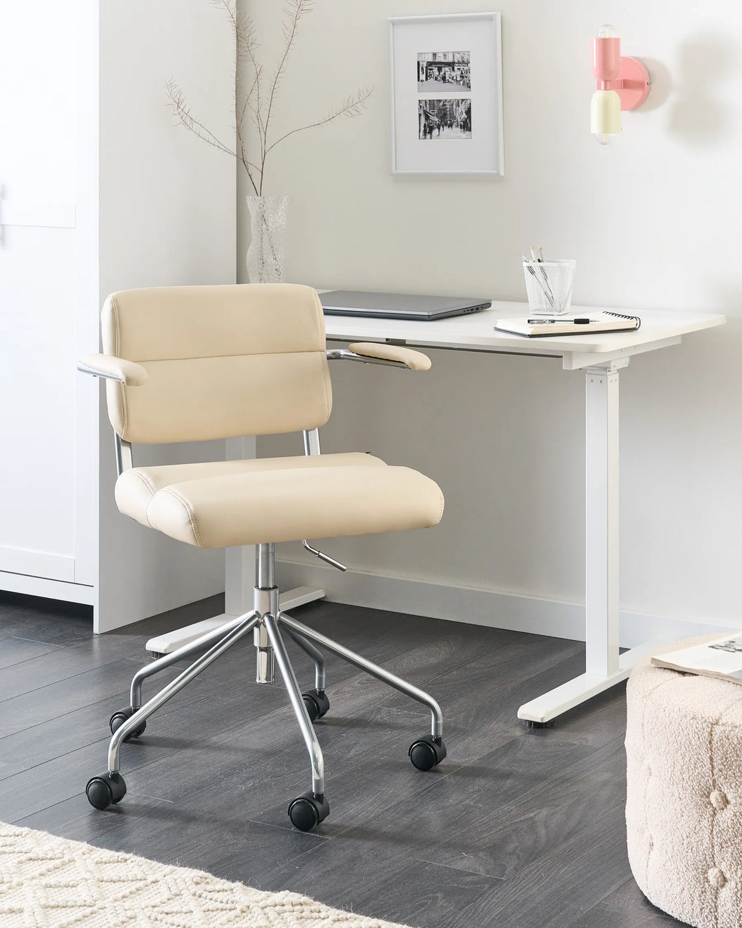 Featuring a sleek off-white faux leather upholstery that's effortless to clean and maintain. 