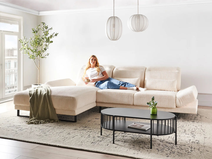 Beige jumbo cord right-hand corner sofa with ribbed upholstery in a modern living room