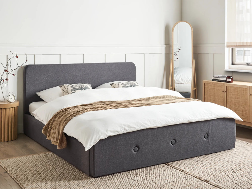 Upholstered bed with tufted headboard and lift-up base