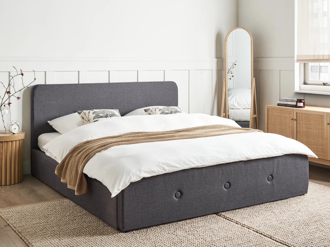 Upholstered bed with tufted headboard and lift-up base