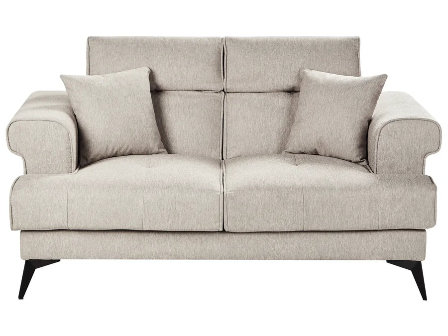 Beige sofa with two cushions on a white background