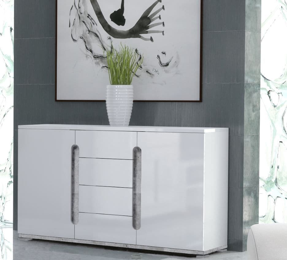 Modern white sideboard with decorative elements against a gray wall.