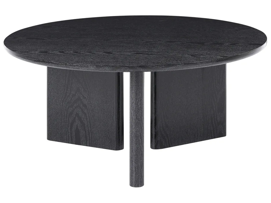 Round black dining table with four legs on a white background