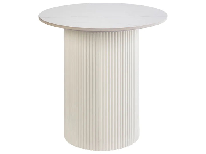 Round white table with ribbed cylindrical base on a white background