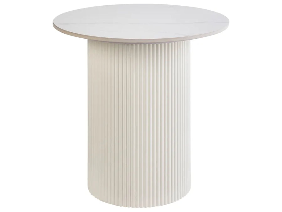 Round white table with ribbed cylindrical base on a white background