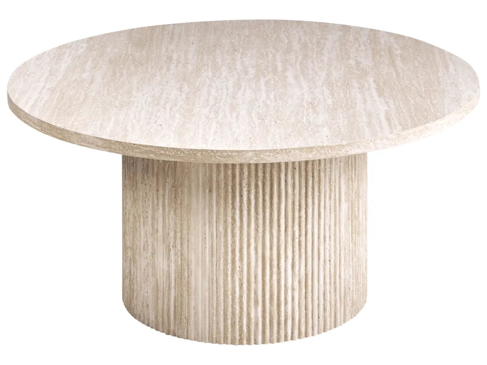 Round dining table with textured surface on a white background