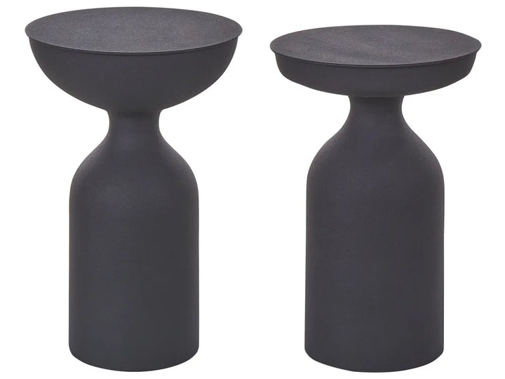Two black side tables on a white background