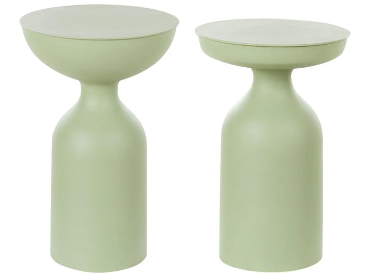 Two green side tables with white tops on a white background