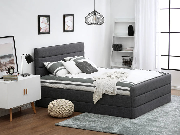 Modern fabric bed with elegant trim detailing