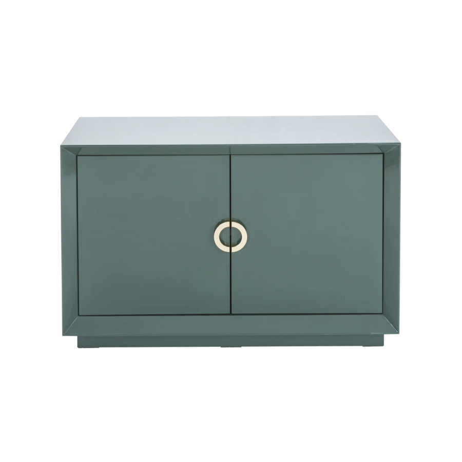 Green cabinet with a gold handle on a white background
