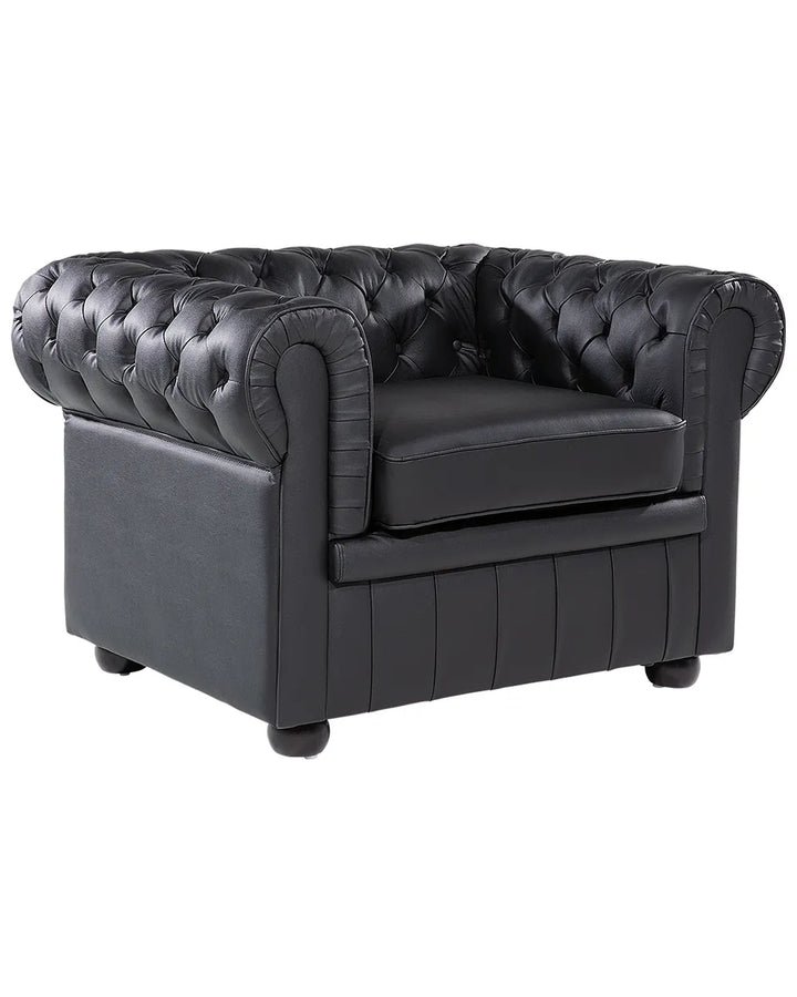 Black leather armchair with tufted backrest on a white background