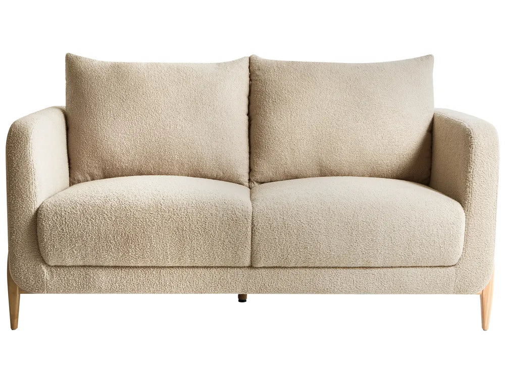 Beige two-seater sofa on a white background