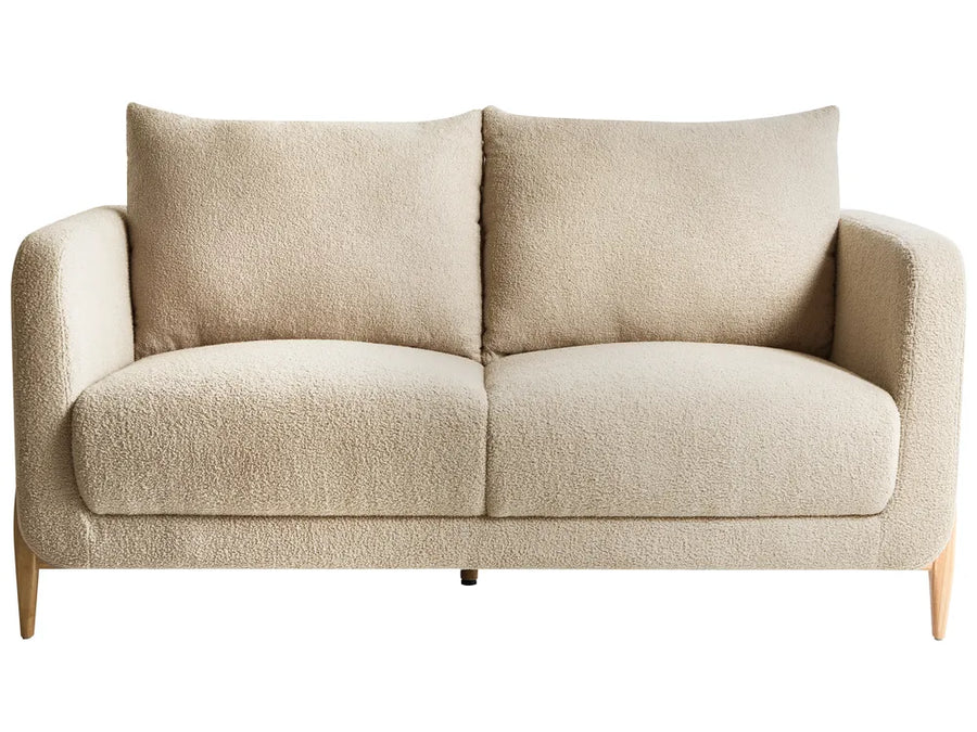 Beige two-seater sofa on a white background
